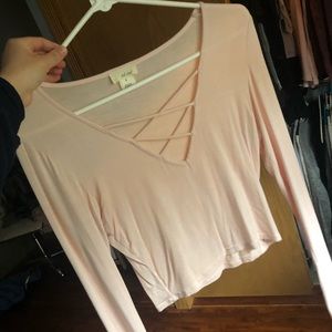 I am selling a sweet pink crop top